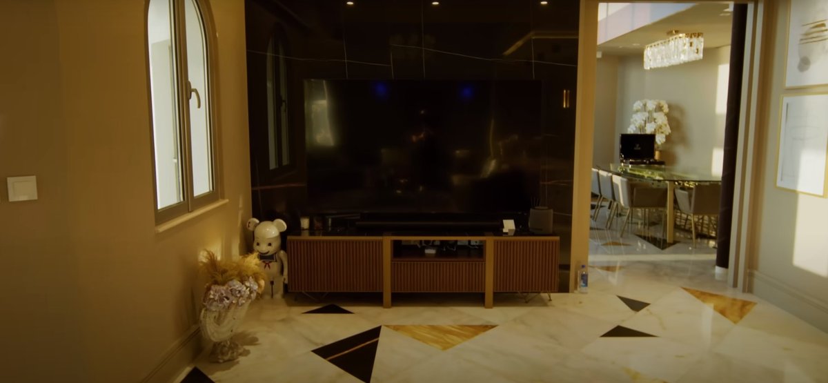 Gadzai huge TV in informal lounge