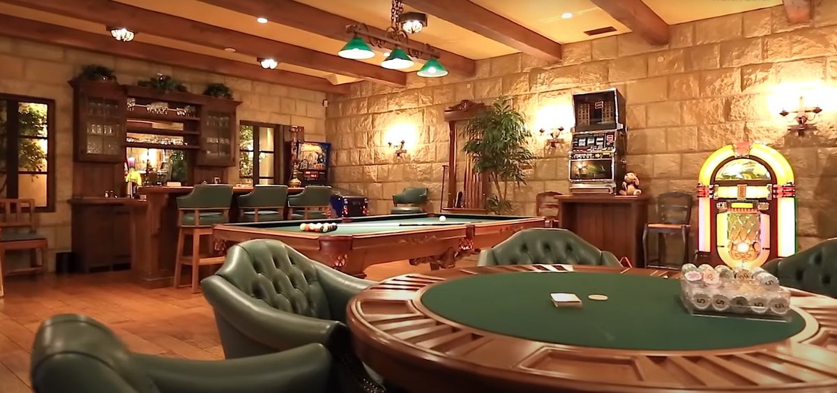 Games room with bar, pool table and poker table